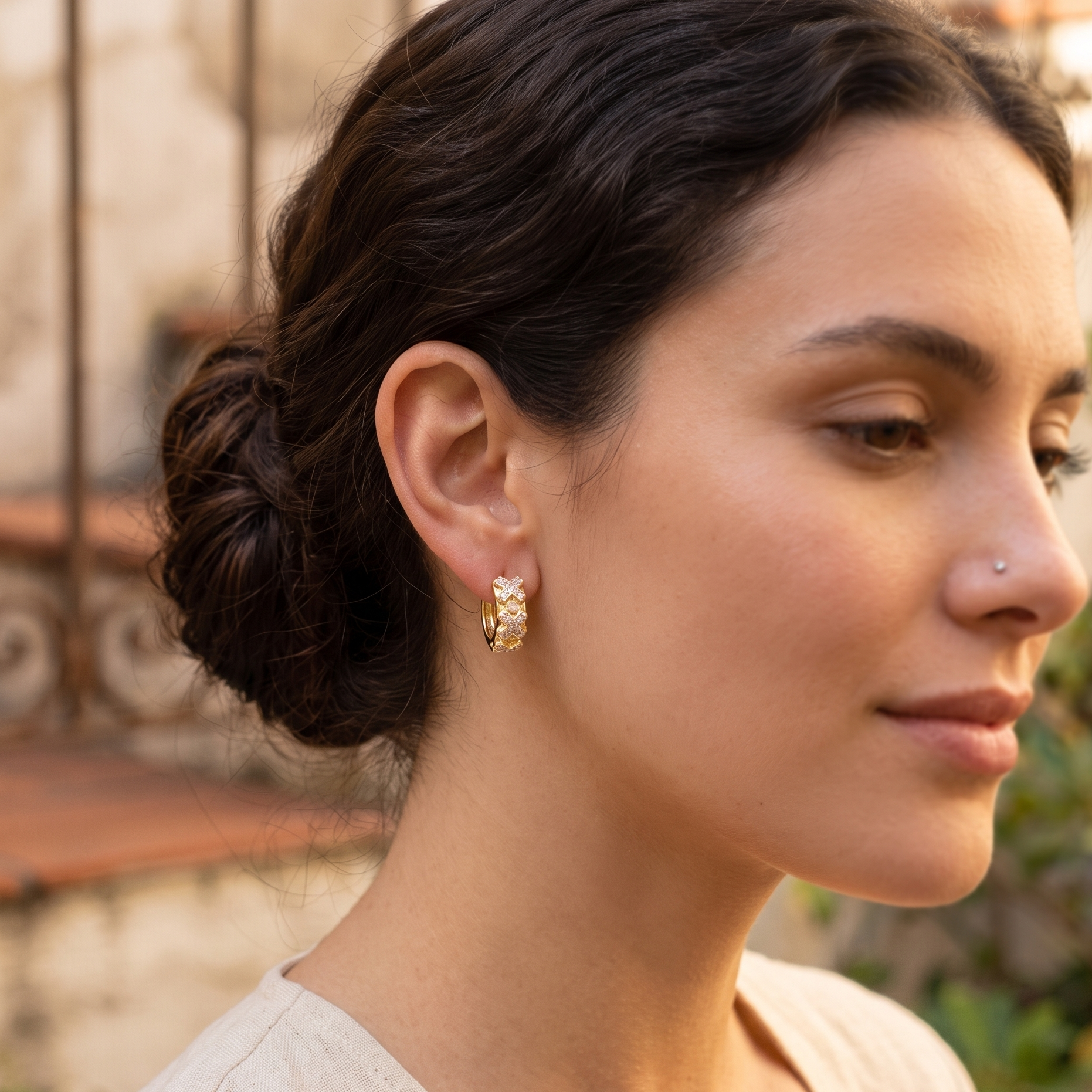 Oro Laminado Gold Filled Criss-Cross CZ Huggie Earrings