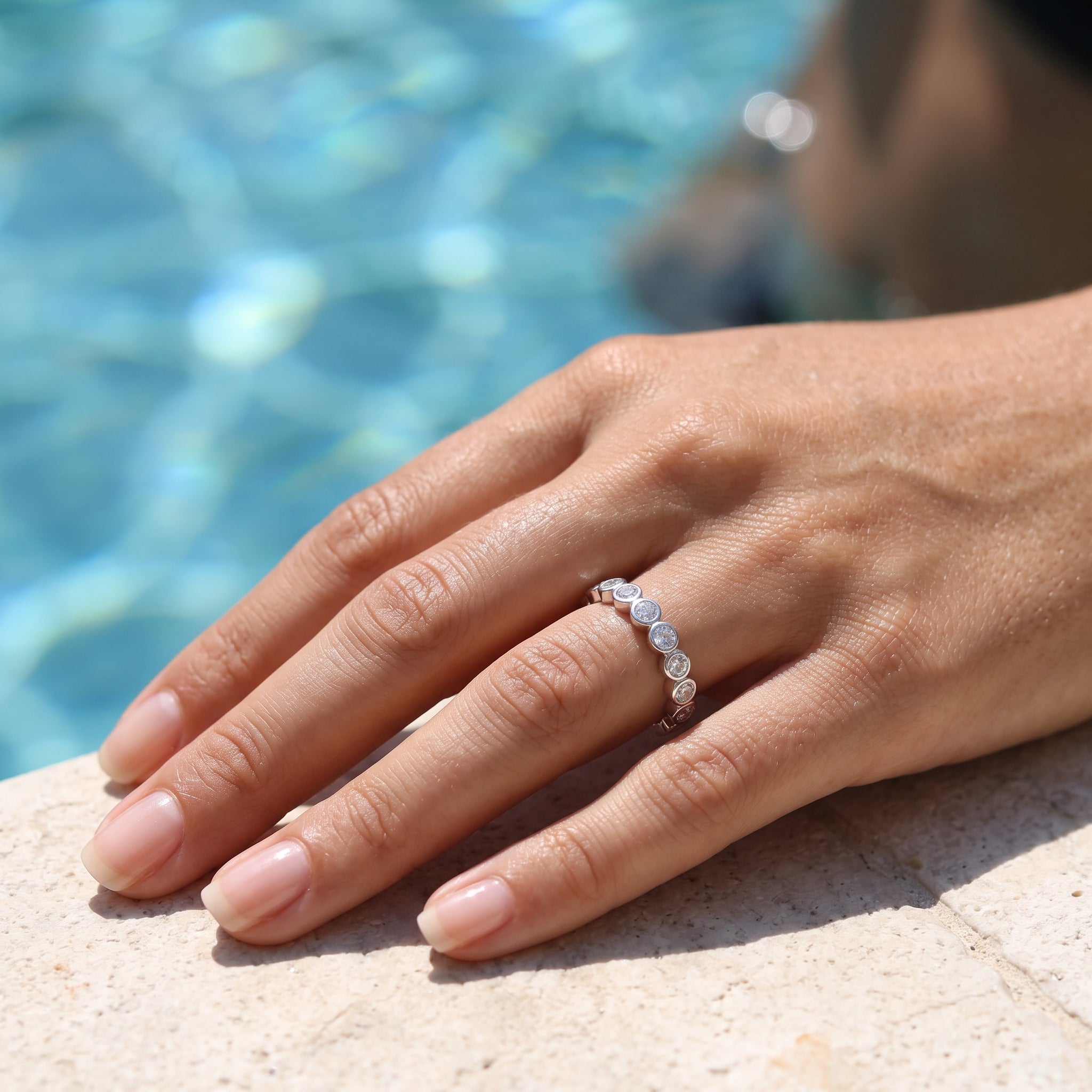 Rhodium Layered French Bezel 2mm Zirconia Eternity Ring